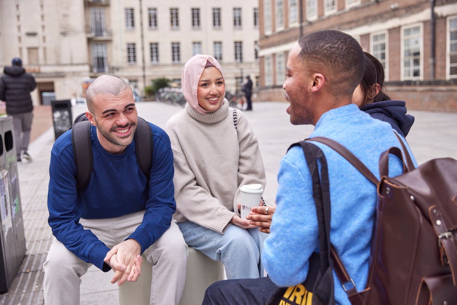 Students talking and smiling