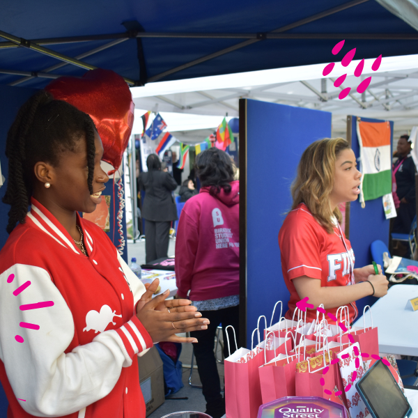 Students at a stall talking