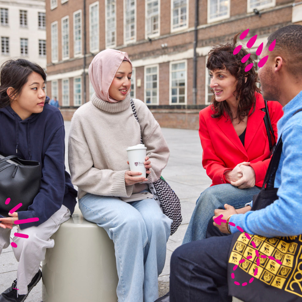 Photo of students laughing in front of Birkbeck university